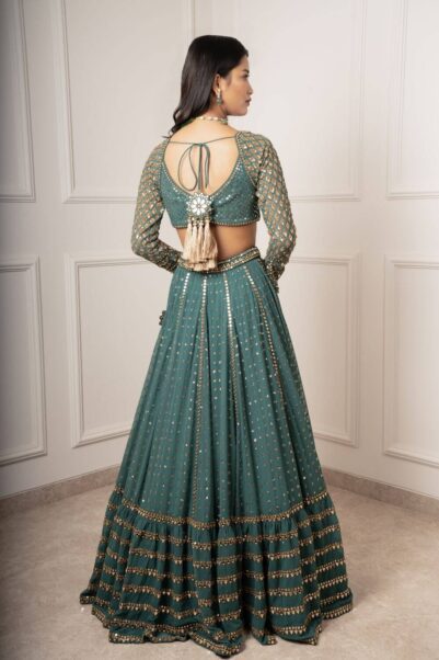 Timeless lehenga crafted by Vvani, showcasing intricate embroidery and luxurious fabric for a grand occasion.