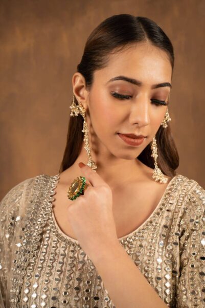 Classic beige lehenga with shimmering sequins for elegant wedding attire - Abhinav Mishra