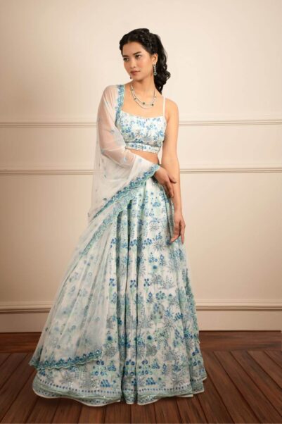 Stylish lehenga set in vibrant pink with intricate detailing for wedding parties - anita dongre