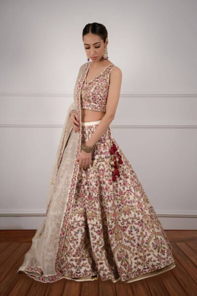 Multicoloured Thread Detailing ivory Lehenga Set by Chamee and Palak
