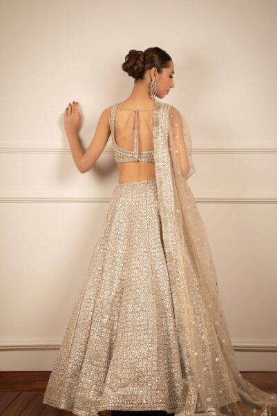 Royal navy blue lehenga with gold embellishments for sangeet celebrations - seema gujral
