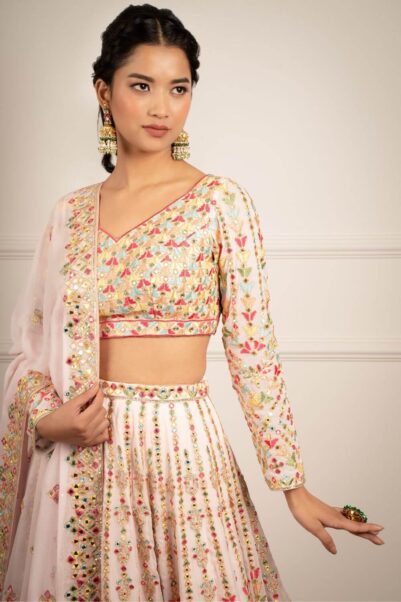 Gorgeous pink wedding lehenga with golden embellishments and flowy dupatta - tamanna punjabi kapoor